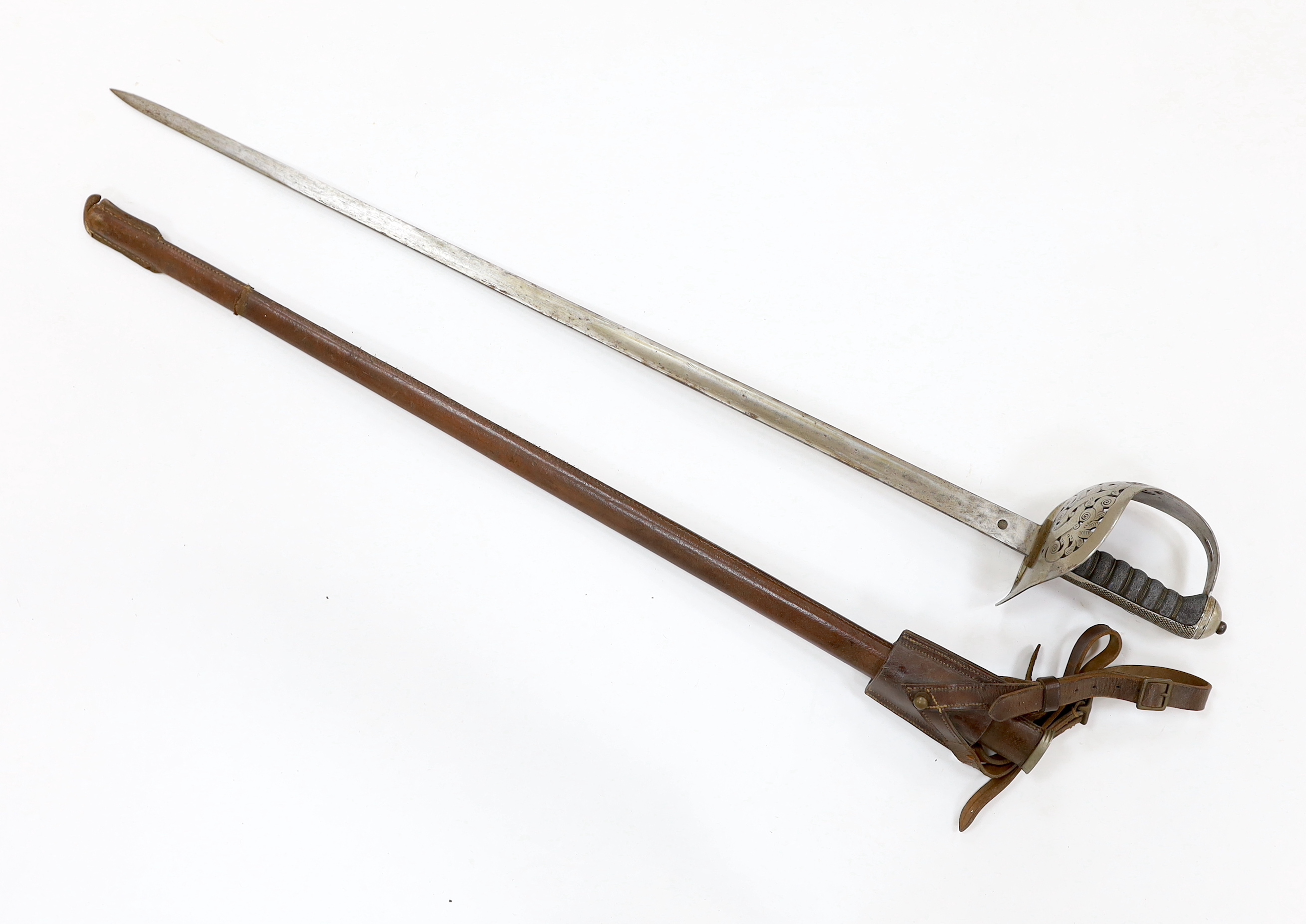 A George V 1897 pattern infantry officer's sword, with scabbard and leather hanger, blade 82cm